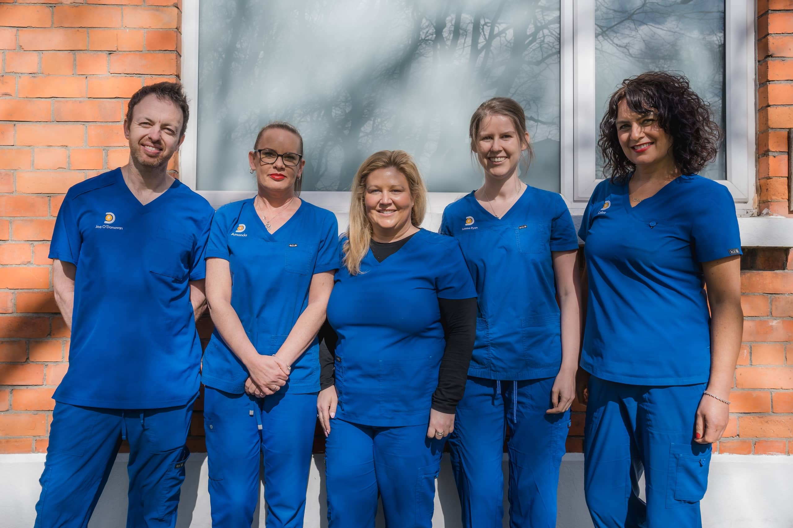 The O'Donovan Dental team outside the practice on Griffith Avenue